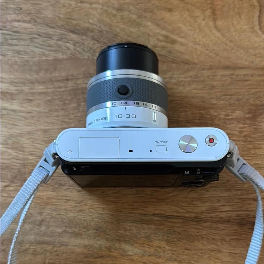 Nikon White Digital Camera with Mirrorless Design and Standard Zoom Lens